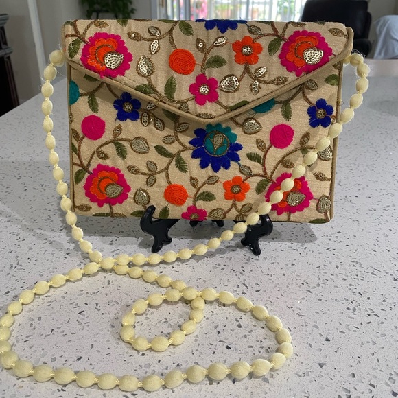 Small embroidered envelope crossbody purse. - Picture 2 of 7